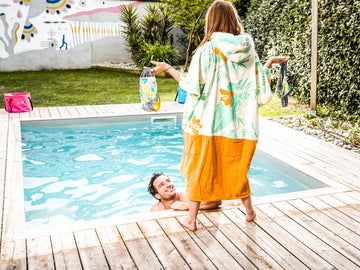 ALL-IN: FUN, PRACTICAL AND INNOVATIVE PONCHOS AND SURF ACCESSORIES.