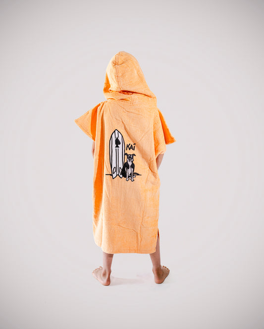 Poncho de bain enfant ALL-IN Kid Kaï Surf, détail imprimé Kaï dos, coloris abricot et navy